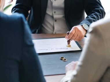 couple signing document