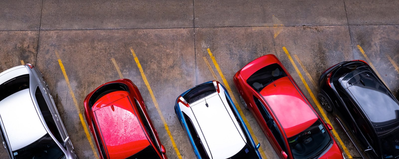 top view of car parked at concrete car parking lot