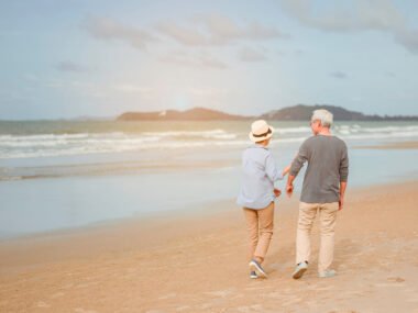 elder couple beach