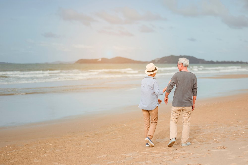 elder couple beach